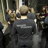 The stage crew standing in a group together.