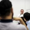 Physics professor lecturing to an undergraduate class