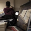 Students reading books in a classroom at Temple University