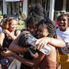 A group of students hugging each during Temple Fest.