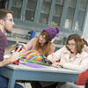 Middle grades education students discussing in class
